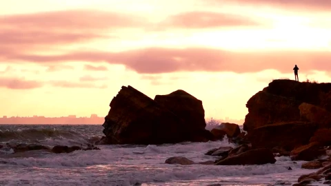 Stock Video A Silhouette Of A Person Over A Rock In The Live Wallpaper For PC - Free Live Wallpaper