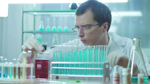 Stock Video A Scientist Experimenting With Tubes On The Lab Live Wallpaper For PC - Free Live Wallpaper