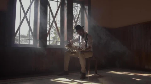 Stock Video A Saxophonist Sitting Holding A Saxophone Live Wallpaper For PC - Free Live Wallpaper