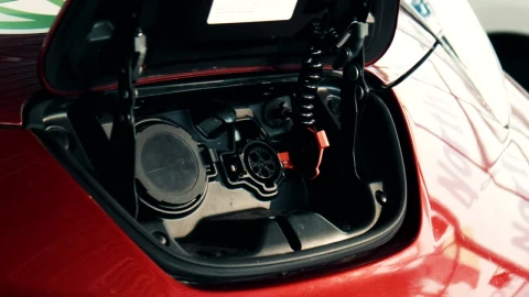 Stock Video A Red Electric Car Being Charged Live Wallpaper For PC - Free Live Wallpaper