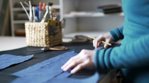 Stock Video A Person Working With Fabric Live Wallpaper For PC - Free Live Wallpaper
