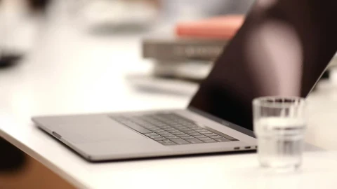 Stock Video A Person Typing In A Laptop At A Coffee Shop Live Wallpaper For PC - Free Live Wallpaper
