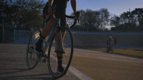 Stock Video A Person Riding A Bicycle To The Side Of A Live Wallpaper For PC - Free Live Wallpaper