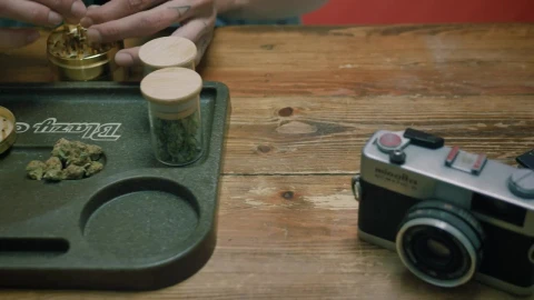 Stock Video A Person Preparing A Marijuana Cigar Live Wallpaper For PC - Free Live Wallpaper