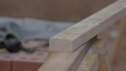 Stock Video A Person Measures A Block Of Wood For Construction Live Wallpaper For PC - Free Live Wallpaper