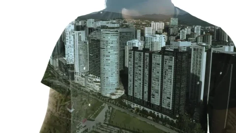 Stock Video A Person Crossing His Arms And A City With Tall Live Wallpaper For PC - Free Live Wallpaper