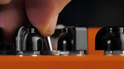 Stock Video A Person Adjusting The Levels Of Some Distortion Pedals Live Wallpaper For PC - Free Live Wallpaper