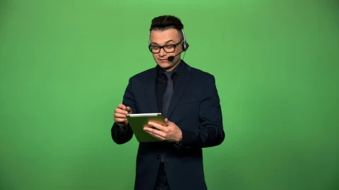 Stock Video A Newscaster With Tablet And Headset Live Wallpaper For PC - Free Live Wallpaper