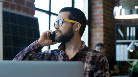 Stock Video A Man With Glasses Speaking On The Phone Live Wallpaper For PC - Free Live Wallpaper