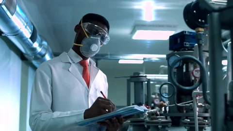 Stock Video A Man With A Face Mask Checking Laboratory Live Wallpaper For PC - Free Live Wallpaper