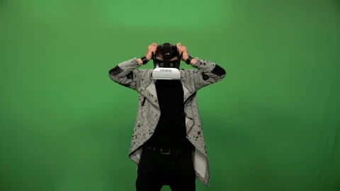 Stock Video A Man Using A Virtual Reality Headset Live Wallpaper For PC - Free Live Wallpaper