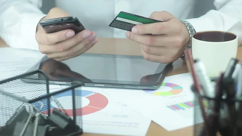 Stock Video A Man Texting On The Phone While Holding A Credit Live Wallpaper For PC - Free Live Wallpaper
