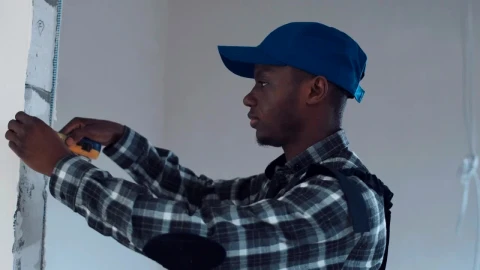 Stock Video A Man Taking Measurements On Construction Site Live Wallpaper For PC - Free Live Wallpaper