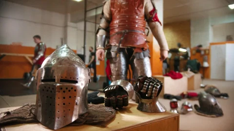 Stock Video A Man In The Dressing Room Putting On The Armor Live Wallpaper For PC - Free Live Wallpaper