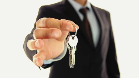 Stock Video A Man In Suit Handing Keys To The Lens Live Wallpaper For PC - Free Live Wallpaper
