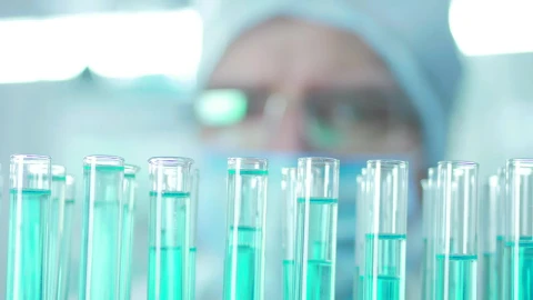 Stock Video A Man Droping Liquid On Lab Tubes Live Wallpaper For PC - Free Live Wallpaper