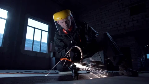 Stock Video A Man Cutting Metal With Machine Live Wallpaper For PC - Free Live Wallpaper