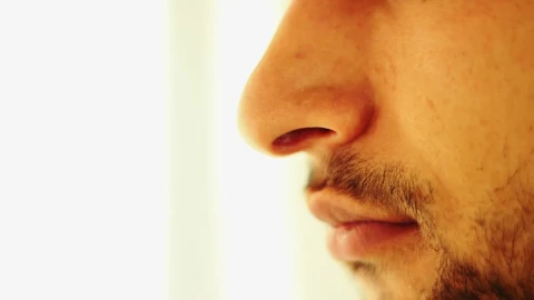 Stock Video A Man Cleaning His Nose With Paper Live Wallpaper For PC - Free Live Wallpaper