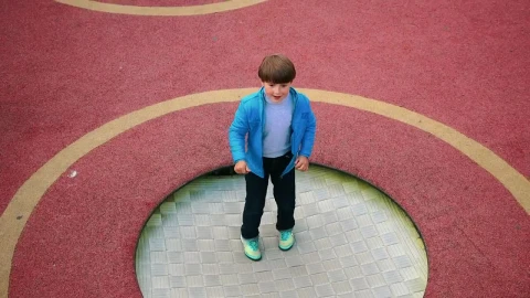 Stock Video A Little Boy Jumping On The Trampoline At The Playground Live Wallpaper For PC - Free Live Wallpaper