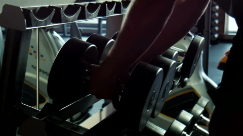 Stock Video A Guy Taking The Dumbbells In The Gym Live Wallpaper For PC - Free Live Wallpaper