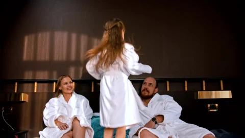Stock Video A Girl Jumping On The Bed In A Bathrobe Live Wallpaper For PC - Free Live Wallpaper
