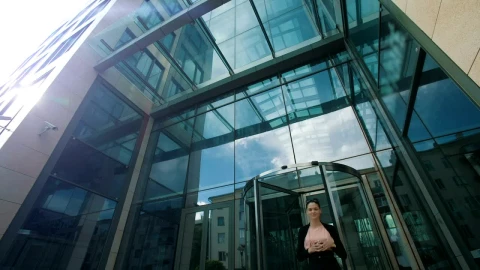 Stock Video Business Woman Takes A Break Outside The Office Live Wallpaper For PC - Free Live Wallpaper