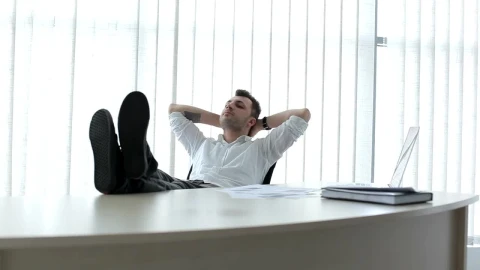 Stock Video Business Man Reclines In Chair And Thinks Live Wallpaper For PC - Free Live Wallpaper
