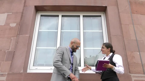 Stock Video Business Man And Woman Greeting Each Other Outdoor Before A Live Wallpaper For PC - Free Live Wallpaper