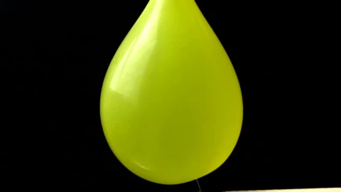Stock Video Bursting A Yellow Water Balloon Live Wallpaper For PC - Free Live Wallpaper