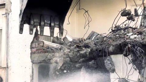 Stock Video Bulldozer Knocking Down The Structure Of A Ruined Building Live Wallpaper For PC - Free Live Wallpaper