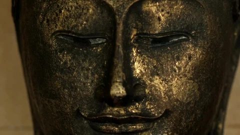 Stock Video Buddha Face From A Metal Statue Live Wallpaper For PC - Free Live Wallpaper