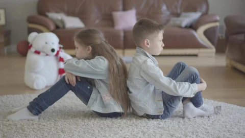 Stock Video Brothers Sitting On Their Backs Annoyed Live Wallpaper For PC - Free Live Wallpaper