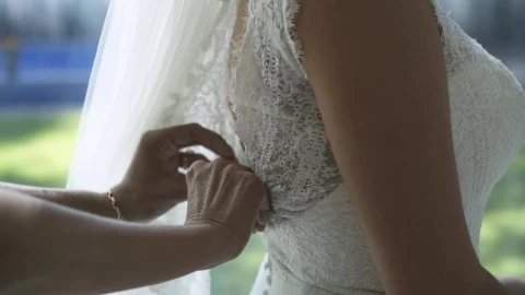 Stock Video Bridesmaid Helping To Put On A Wedding Dress Live Wallpaper For PC - Free Live Wallpaper