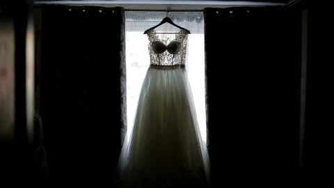Stock Video Bride Admires Wedding Dress Hanging In Window Live Wallpaper For PC - Free Live Wallpaper