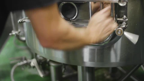 Stock Video Brewer Opening A Barley Bagasse Tank Live Wallpaper For PC - Free Live Wallpaper