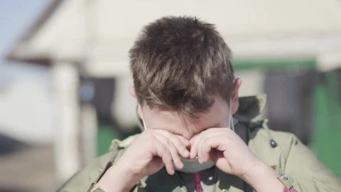 Stock Video Boy With Face Mask Coughs And Rubs His Eyes Live Wallpaper For PC - Free Live Wallpaper
