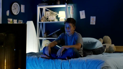 Stock Video Boy Watching A Funny Show On The Tv Late At Live Wallpaper For PC - Free Live Wallpaper