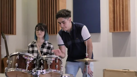 Stock Video Boy Teaching A Girl To Play Drums Live Wallpaper For PC - Free Live Wallpaper