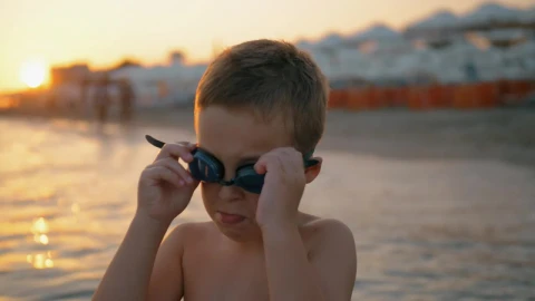 Stock Video Boy Putting On Swimming Goggles Live Wallpaper For PC - Free Live Wallpaper