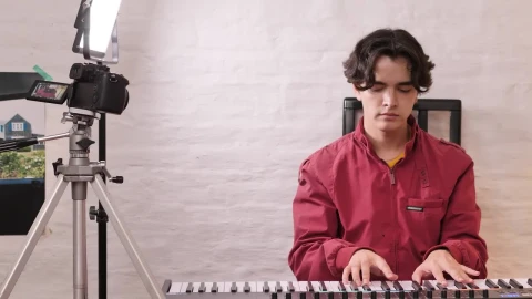 Stock Video Boy Playing Piano Being Recorded Live Wallpaper For PC - Free Live Wallpaper