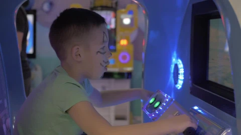 Stock Video Boy Playing On An Arcade Machine Live Wallpaper For PC - Free Live Wallpaper