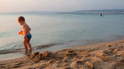 Stock Video Boy Playing At The Seashore Live Wallpaper For PC - Free Live Wallpaper