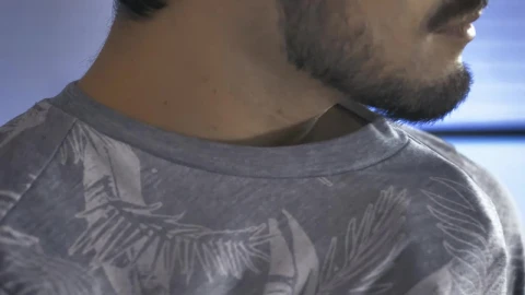 Stock Video Boy Placing A Lapel Microphone On His Shirt Live Wallpaper For PC - Free Live Wallpaper