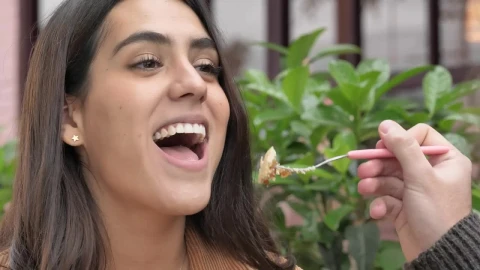 Stock Video Boy Feeding Cake To His Girlfriend Live Wallpaper For PC - Free Live Wallpaper