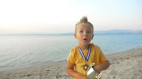 Stock Video Boy Celebrating With His Trophy Live Wallpaper For PC - Free Live Wallpaper