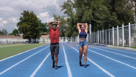 Stock Video Boy And Girl Warming Up And Stretching Before Exercise Live Wallpaper For PC - Free Live Wallpaper