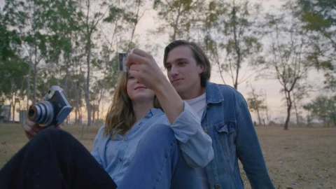 Stock Video Boy And Girl Taking Photos In Nature Live Wallpaper For PC - Free Live Wallpaper