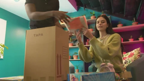 Stock Video Boy And Girl Packing Things In A Box Live Wallpaper For PC - Free Live Wallpaper