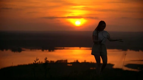 Stock Video Boy And Girl Playing Badminton In The Sunset Live Wallpaper For PC - Free Live Wallpaper