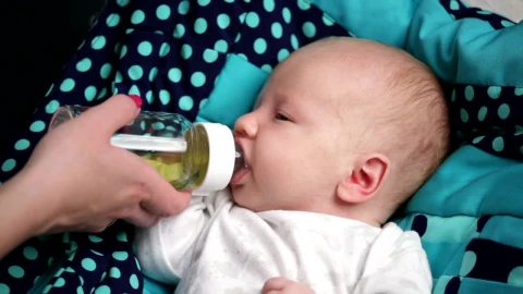 Stock Video Bottle Feeding A Young Baby Live Wallpaper For PC - Free Live Wallpaper